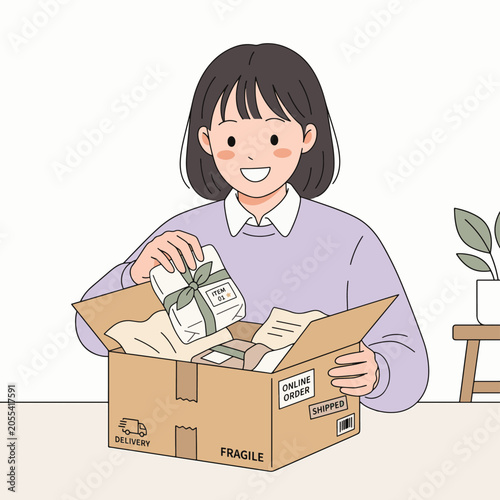 A smiling young woman with short dark hair is opening a cardboard delivery box, holding up a small gift inside. She is wearing a light purple sweater and a white collared shirt.