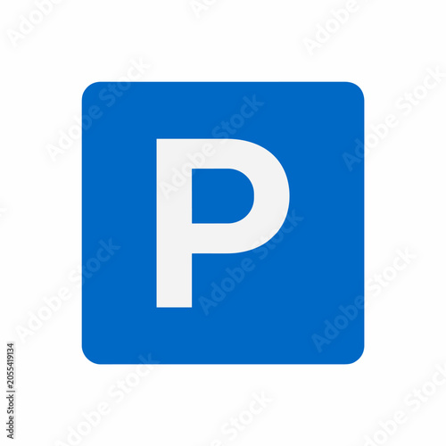 Foto A clear white letter P symbol on a vibrant blue square background, indicating parking availability or a designated parking zone
