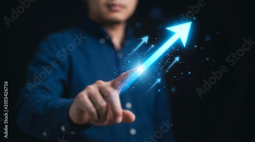 man touching glowing blue arrow pointing upwards growth concept