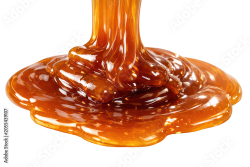 Chocolate dripping on white background isolated melted chocolate flow dessert sweet sauce texture flowing liquid cocoa milk cream abstract closeup