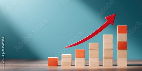 Wooden cubes stacked like steps with arrow rising upward. Business growth, success, progress. Wood blocks staircase and red line going up. Blue background. Conceptual bar chart. Increasing results.