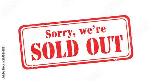 A bold red sale sign with white text saying sorry we're sold out, framed by a thick red border standing out against a plain