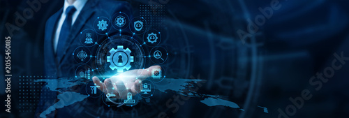 Canvastavla IT security admin hand holding digital tablet configuring secure user permissions for Access Management protocols and data privacy