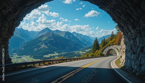 Scenic mountain road journey through tunnel with breathtaking alpine landscape view