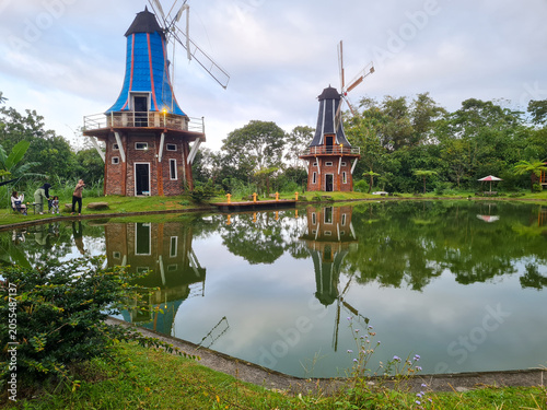 Beautiful views of the reservoir and windmills at The Lost World Farm tourist attraction and camping ground located in Kaliurang,Indonesia.