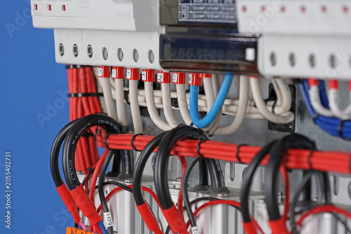 Connecting electrical modules using copper insulated electrical wires in the electrical switchboard. 