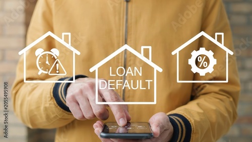 Person using smartphone with loan default concept icons on screen