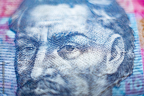 Macro portrait of Ukraine currency note – close-up of eyes on 10 hryvnia banknote