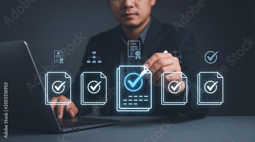 Person selecting approved document icon on digital interface with laptop, showcasing technology hand for modern digital & technology