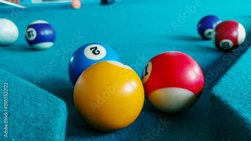 Foto Close-up macro photograph of colorful billiard pool balls with authentic chalk m