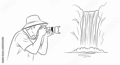 man photographing waterfall