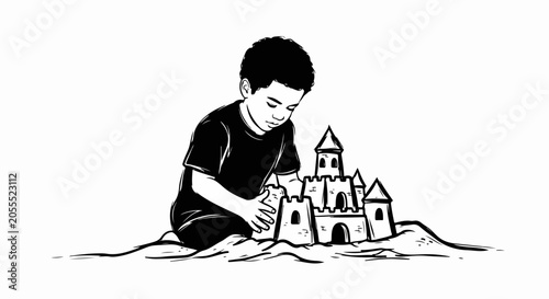 boy building sandcastle