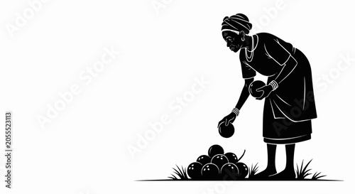 woman planting seeds in garden