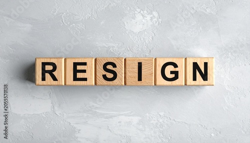 Wooden Blocks Spelling Resign Symbolizing Stepping Down
