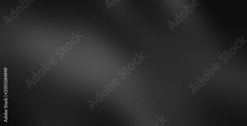 Photos Dark textured surface with soft, flowing gradients