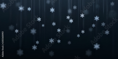 Snowflakes falling during winter night with soft focus and bokeh effect