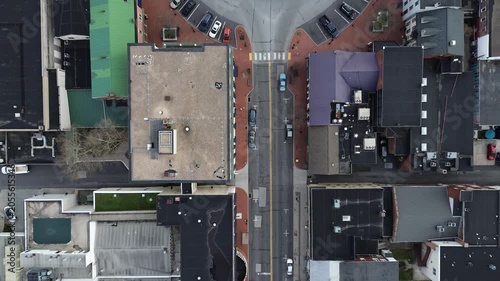 Roundabout district view centers on Lincoln Square linking Baltimore Street, Carlisle Street, Chambersburg Street with dense commercial facades. Mixed roofing, HVAC units emphasize tight, PA