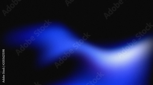 Abstract blue light wave gradient with a soft grainy texture on a dark black background