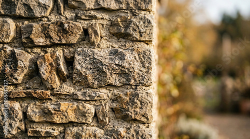 Rubble masonry from quarry stone with a natural backdrop and soft lighting