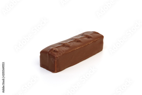 Chocolate bar with milky filling and nuts isolated on white background.