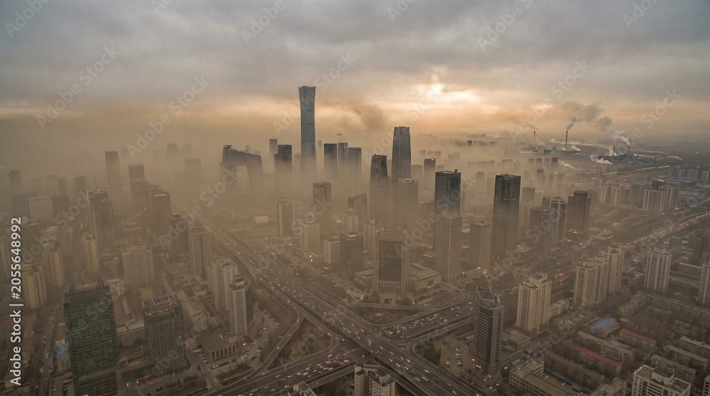 Fototapeta premium Urban Skyline Covered by Severe Smog and Industrial Emissions Illustrating Air Pollution Climate Change and Public Health Risks