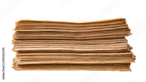 Schilderij op canvas Thick stack of brown kraft paper sheets, isolated on transparent background