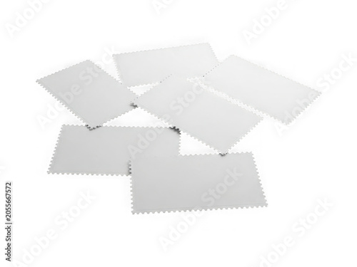 Collection of blank white perforated paper sheets on a white background isolated on transparent background