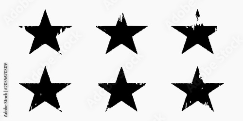 Grunge style star shapes black vector silhouettes on white background