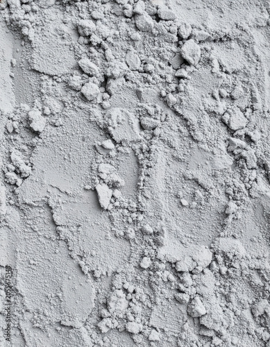 Powdered cement texture with surface marks, industrial material detail