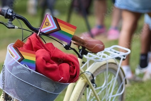 Bicycle carrying progress pride flags promoting lgbtq inclusion