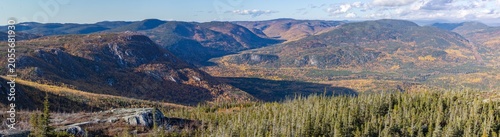 Panoramic aerial view of autumn mountains and valley in Charlevoix, Quebec