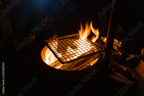 Campfire Grill with Flames at Night, Camping, Quebec