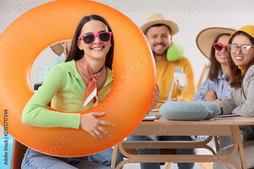 Happy young woman with infl...