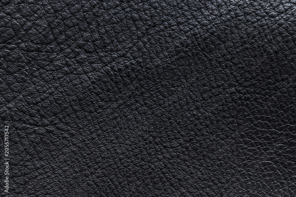Fototapeta premium Black leather texture background with detailed grain pattern, abstract material surface for design and fashion industry