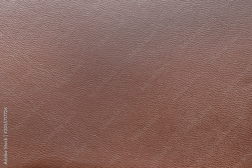 Fototapeta premium Brown leather texture background with fine grain pattern, natural material surface for upholstery and design projects