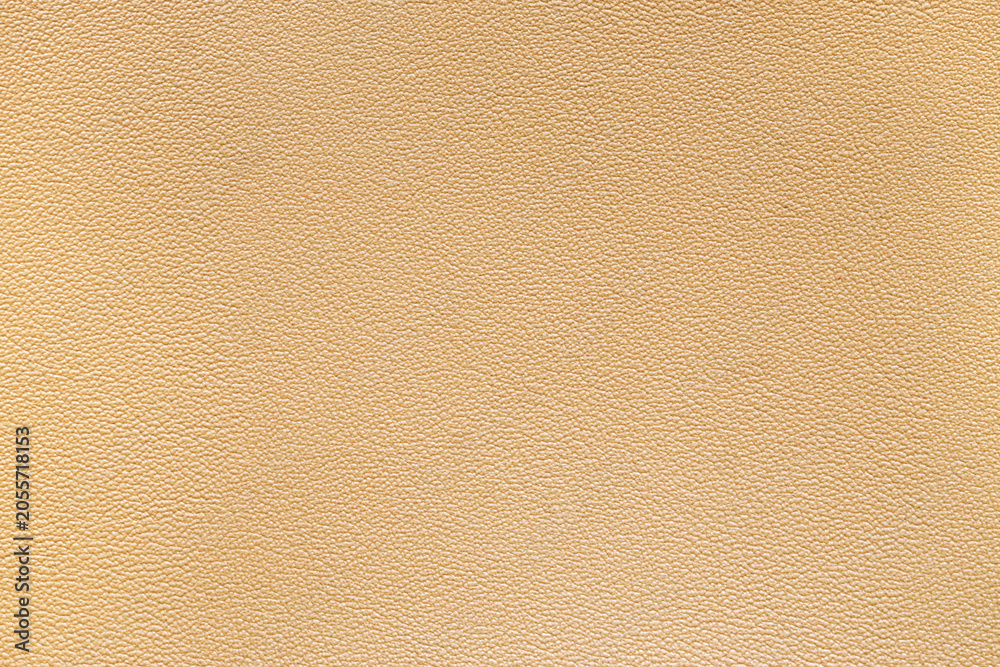 Fototapeta premium Light brown leather texture background with fine grain pattern, natural material surface for design and upholstery, this abstract backdrop is suitable for various design applications