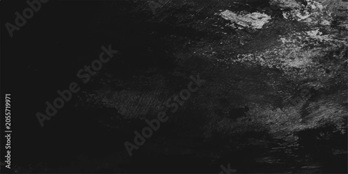 Tableau sur toile A dark, grainy black and white image shows a turbulent sea with crashing waves and white foam under a cloudy sky