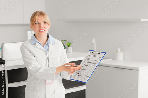Smiling female doctor or me...
