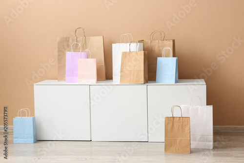 Assorted shopping bags on w...