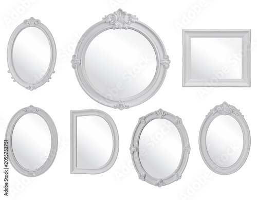 A collection of ornate white mirrors with decorative frames.