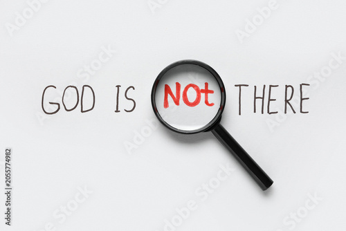 Quadro su tela Magnifying glass over not in god is not there text, atheism and doubt concep