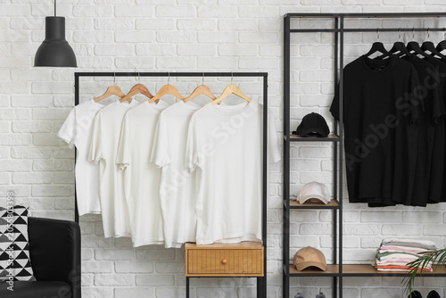White and black t-shirts on...