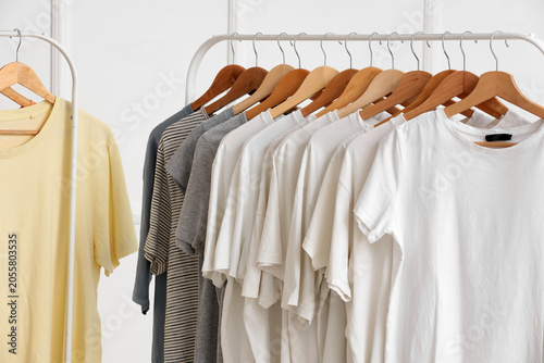Assorted t-shirts on clothi...