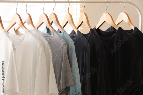 Row of assorted plain t-shi...