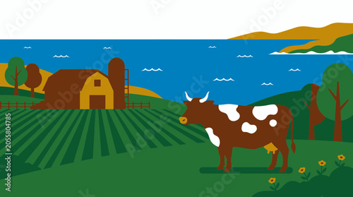 Photography Brown cow grazing in a green field near sea.