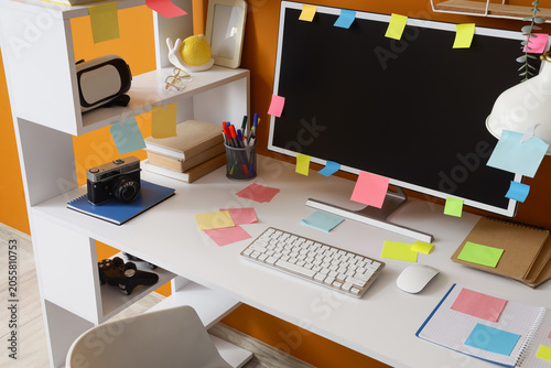 Workplace with blank comput...