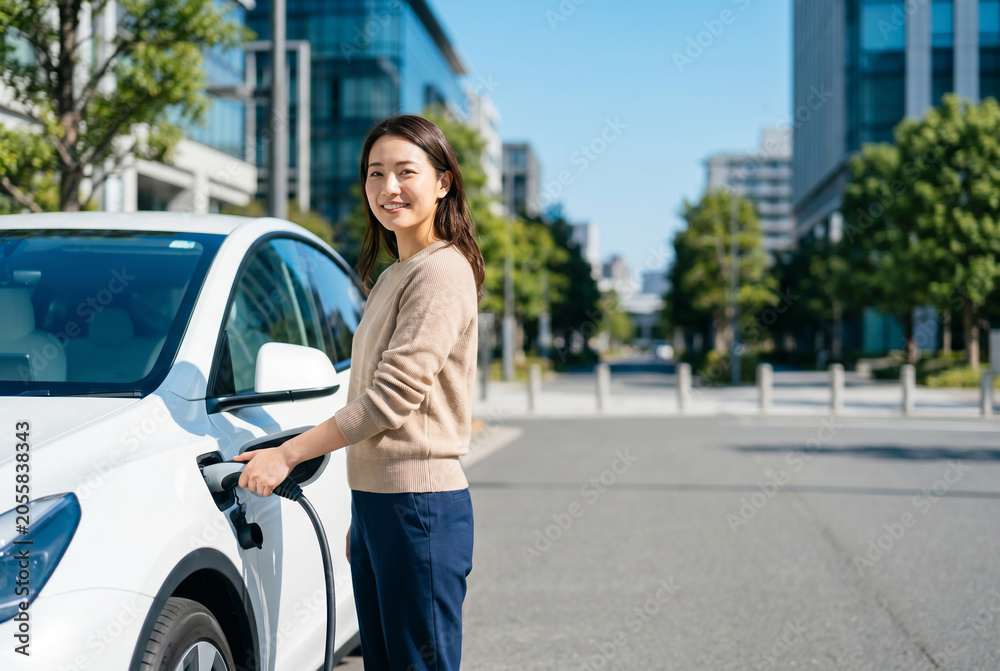Fototapeta premium 電気自動車を充電スタンドで充電する笑顔の女性 Generative AI