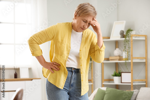 Mature woman experiencing m...
