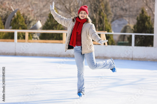 Happy young woman in winter...