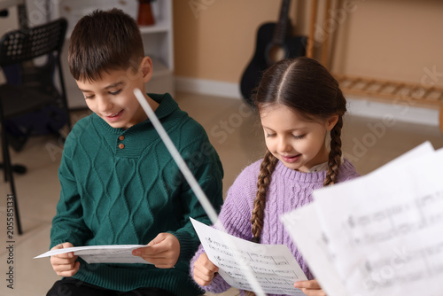 Young boy and girl learning...